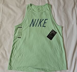 Nike Women's Light Green Tank Top with Blue Logo